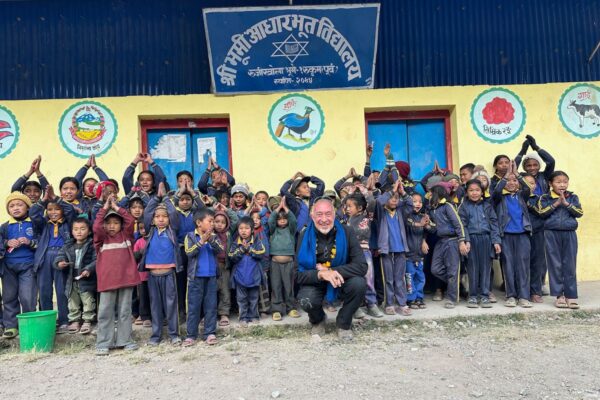 Michael with schoolkids